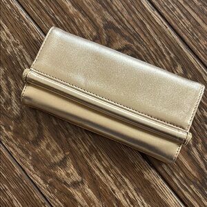 Ann Taylor NWT gold clutch